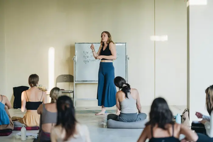 A guided yoga class with a teacher at Bali Yoga Retreats in Ubud