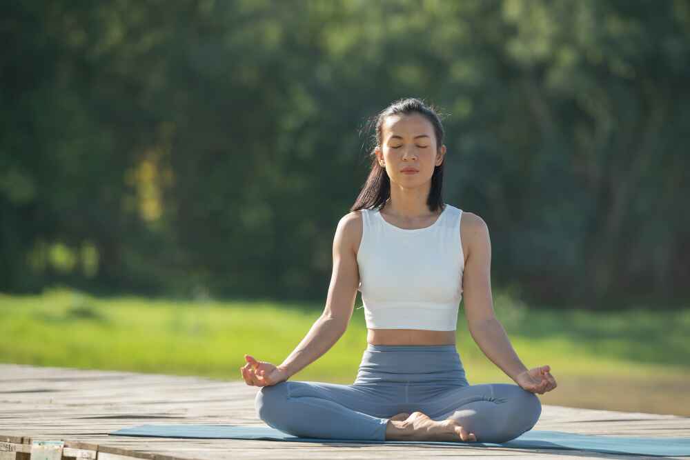 a woman meditating