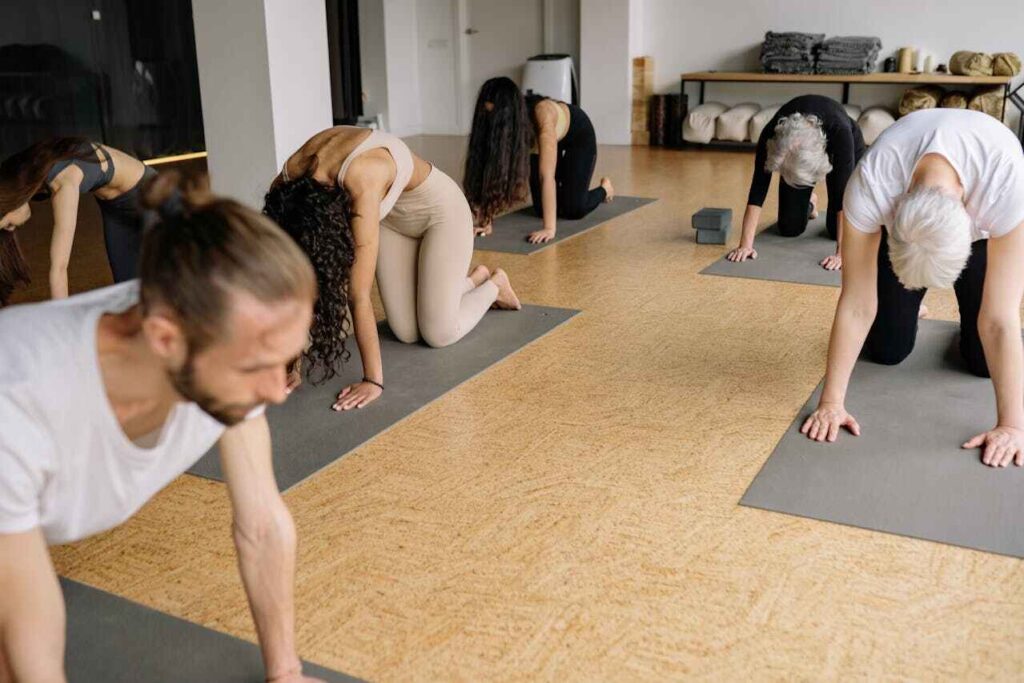 a group of people doing yoga