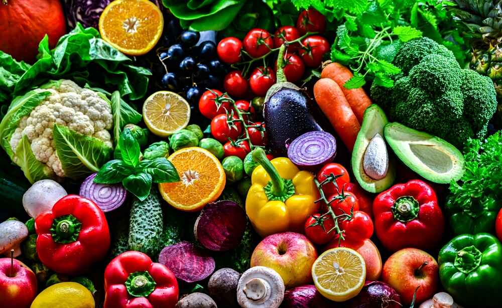 Fresh fruits like oranges, apples, and grapes Fresh fruits like oranges, apples, and grapes