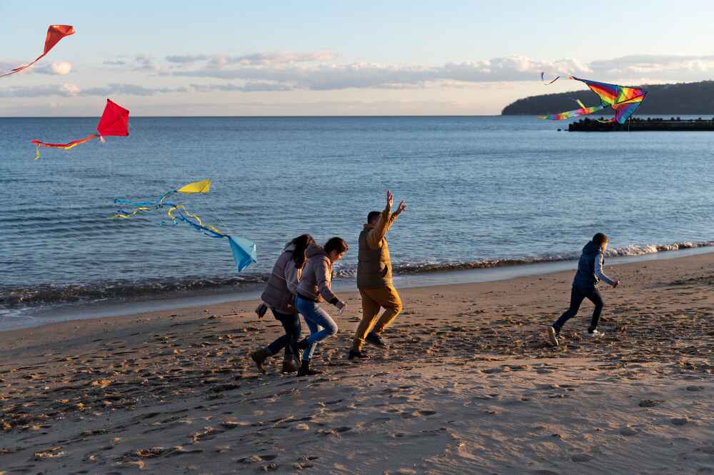 A Group Of People Enjoying Bali Kite Festival