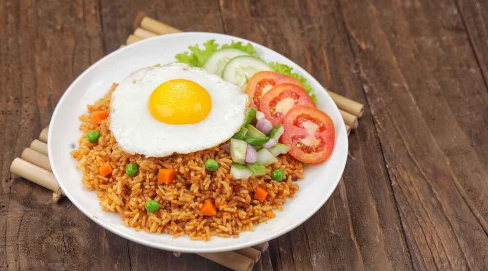 Nasi Goreng, Indonesian Fried Rice With Egg and Vegetables