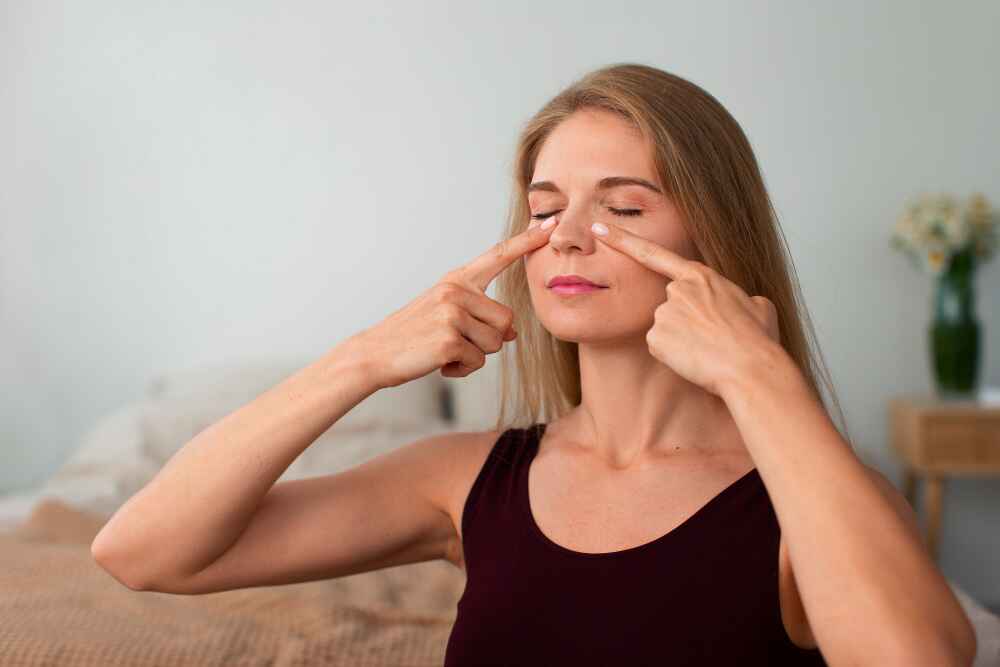 Woman Doing Face Yoga