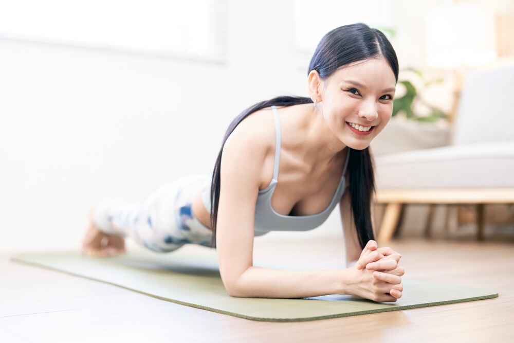 A Woman Doing Forearm Plank A Woman Doing Forearm Plank