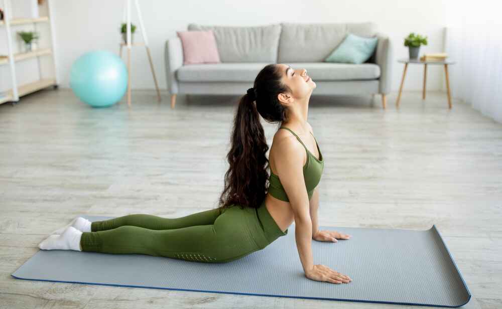Woman Practising Bhujangasana