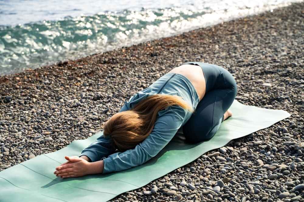 Woman Doing Child's Pose Woman Doing Child's Pose