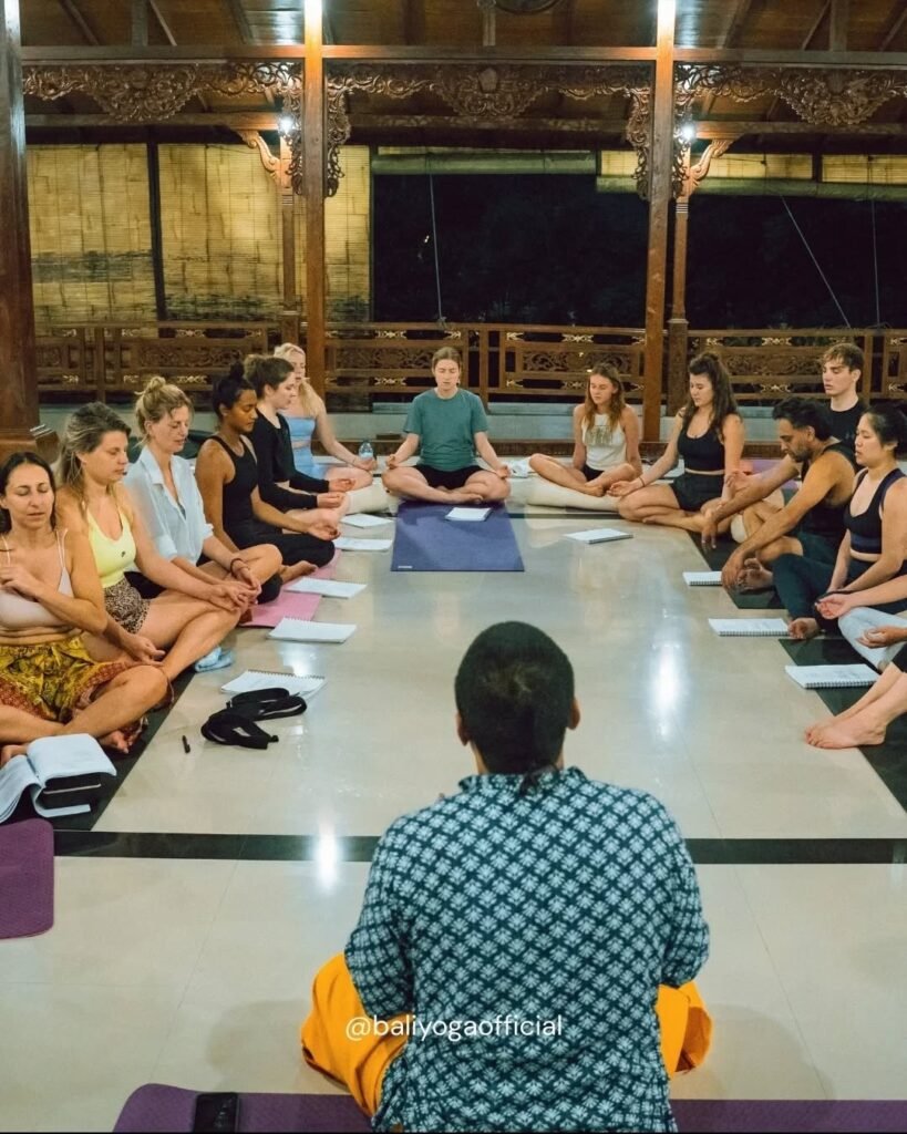 Students Practicing Pranayama in a Class Students Practicing Pranayama in a Class